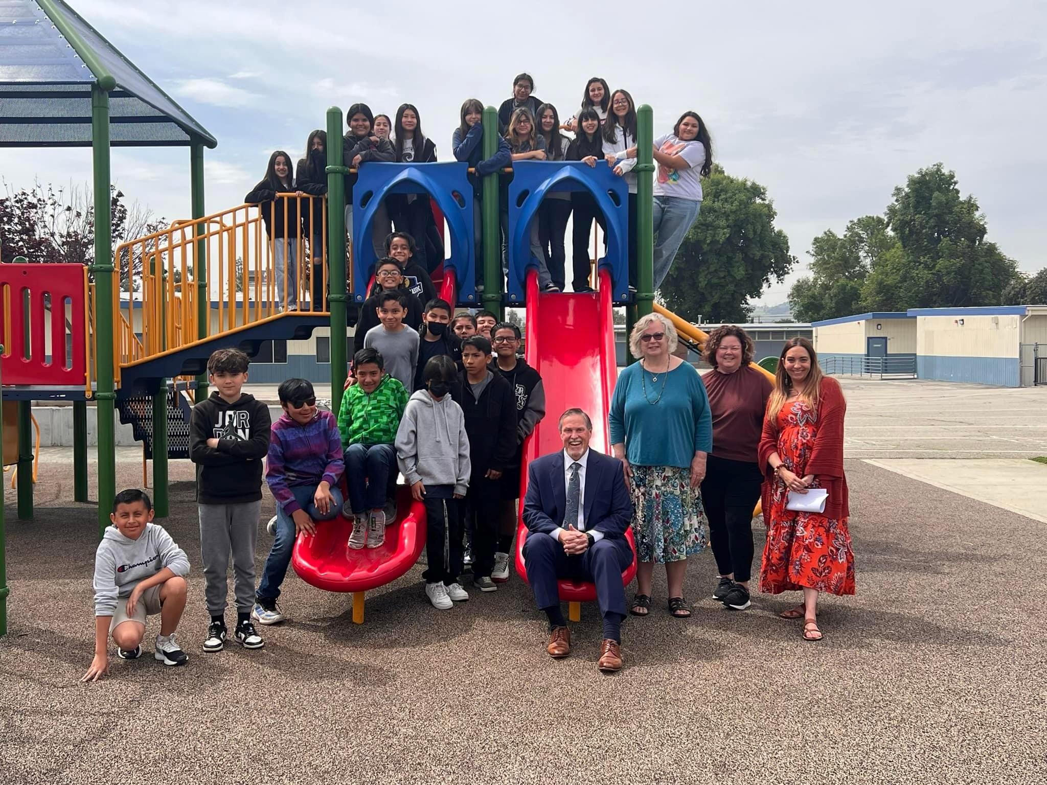 Picture at Madison ES playground with Superintendent